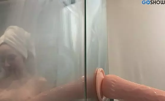 Intense Dildo Sucking Scene in Wet Shower Masturbation
